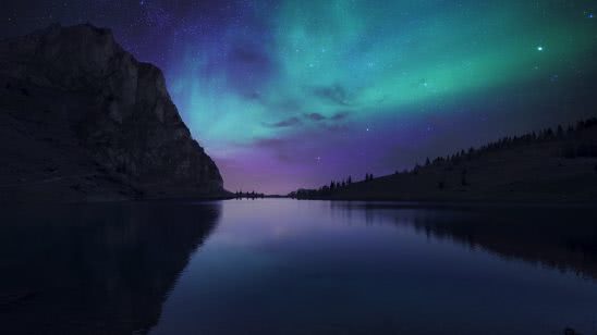northern lights aurora borealis over lake uhd 4k wallpaper